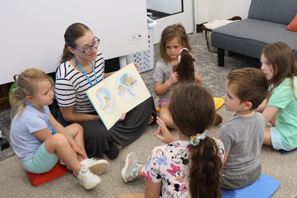 Darby reading to students.